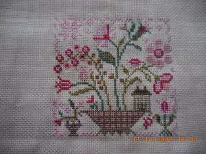 Fairy Garden by Blackbird Designs stitched piece.