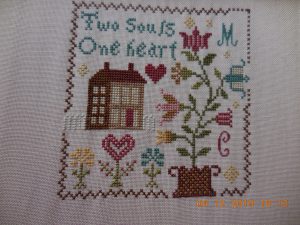 Hearts in Bloom Stitched piece.