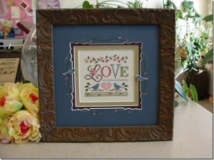 A Little Love framed by Jill Rensel.